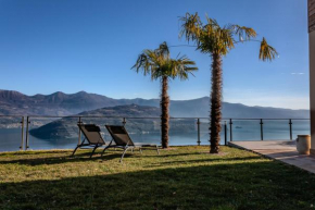 MIA ISOLA with lake view, garden and swimming pool